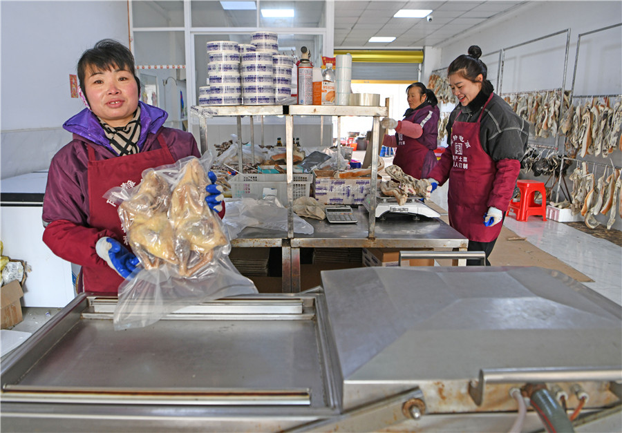 各類特色臘味銷往全國各地。陳彬攝