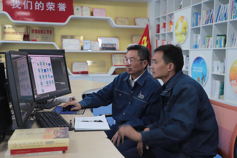許啟金（左）與廖志斌。李蕩攝